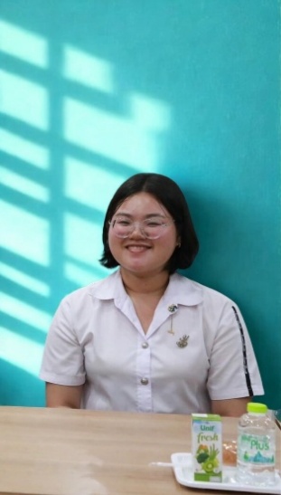 A person smiling at the camera AI-generated content may be incorrect.