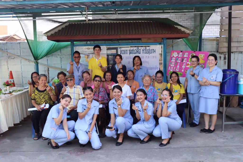 A group of people posing for a picture Description automatically generated