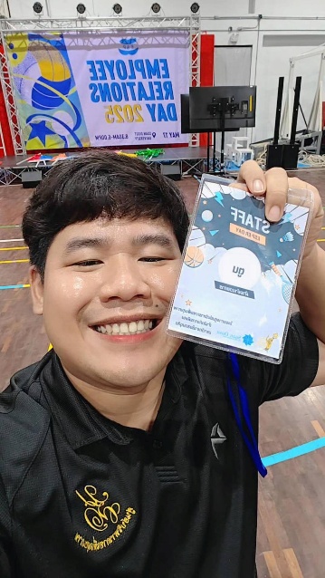 A person holding up a badge AI-generated content may be incorrect.