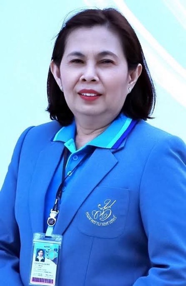A person in a blue suit Description automatically generated
