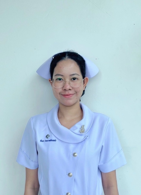 A person in a nurse uniform Description automatically generated